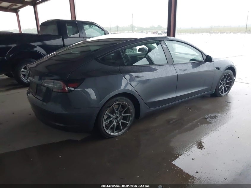 2021 Tesla Model 3 VIN 5YJ3E1EA7MF016497 IAAI salvage auction — RIGHT SIDE, Original (Texas), sold $11,350 on 2026-07-23 (photo 4)