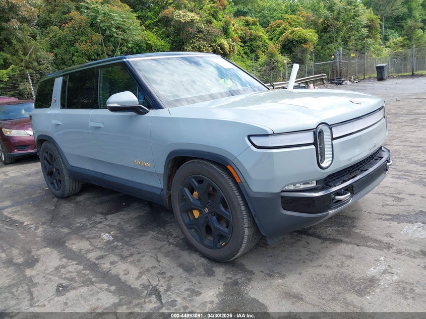 2023 Rivian R1s VIN 7PDSGABA4PN025716 IAAI salvage auction — FRONT & REAR, Salvage (North Carolina), sold $21,150 on 2026-07-09 (photo 1)