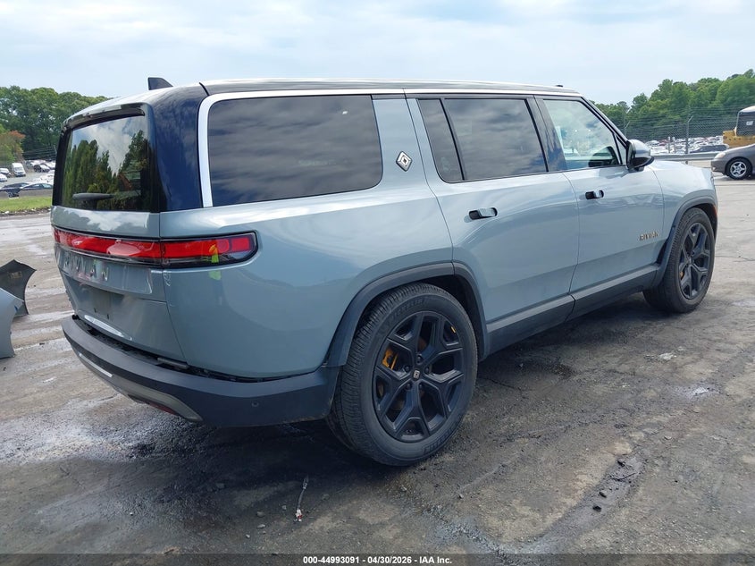 2023 Rivian R1s VIN 7PDSGABA4PN025716 IAAI salvage auction — FRONT & REAR, Salvage (North Carolina), sold $21,150 on 2026-07-09 (photo 4)