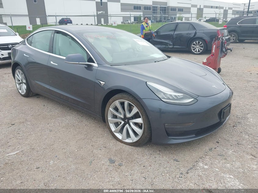 2019 Tesla Model 3 VIN 5YJ3E1EB7KF391604 IAAI salvage auction — LEFT FRONT, Original (Texas), sold $8,400 on 2026-07-09 (photo 1)