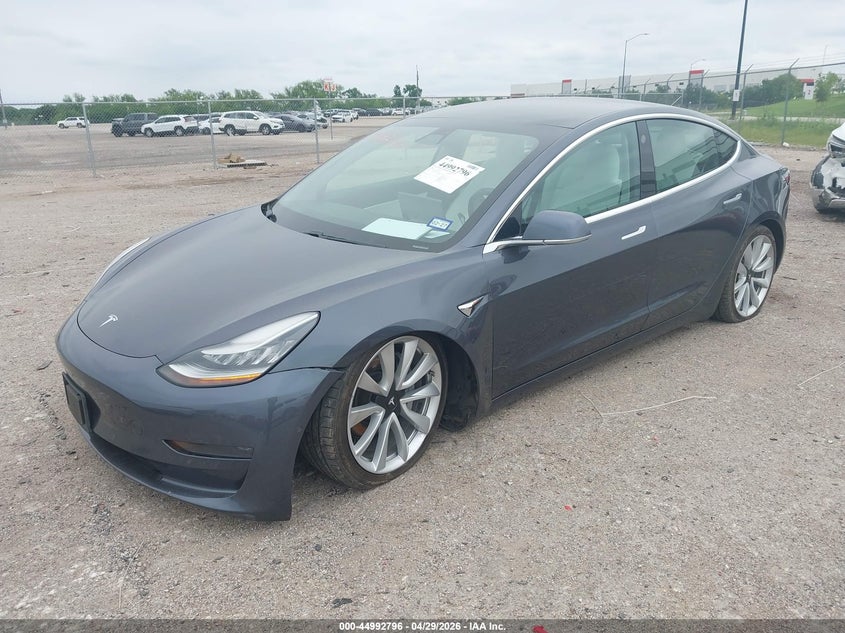 2019 Tesla Model 3 VIN 5YJ3E1EB7KF391604 IAAI salvage auction — LEFT FRONT, Original (Texas), sold $8,400 on 2026-07-09 (photo 2)