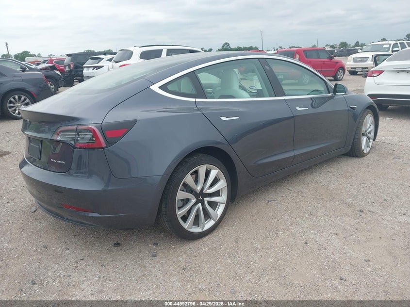 2019 Tesla Model 3 VIN 5YJ3E1EB7KF391604 IAAI salvage auction — LEFT FRONT, Original (Texas), sold $8,400 on 2026-07-09 (photo 4)