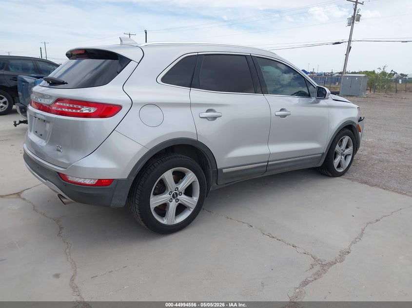 2015 Lincoln Mkc VIN 5LMCJ1A97FUJ32597 IAAI salvage auction — RIGHT FRONT, Original (Texas), sold $1,100 on 2026-07-09 (photo 4)