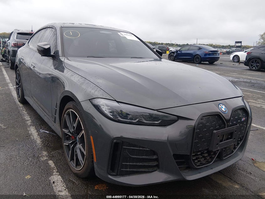 2024 BMW i4 VIN WBY33AW00RFT58466 — IAAI salvage auction photo
