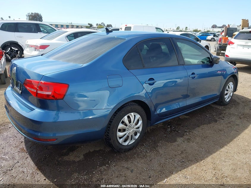 2015 Volkswagen Jetta VIN 3VW2K7AJ1FM357516 IAAI salvage auction — LEFT SIDE, Salvage (California), sold $1,225 on 2026-09-08 (photo 4)