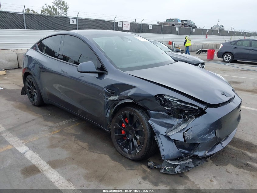 2023 Tesla Model y VIN 7SAYGDEDXPF966310 IAAI salvage auction — RIGHT FRONT, Salvage (Arizona), sold $8,700 on 2026-08-01 (photo 1)