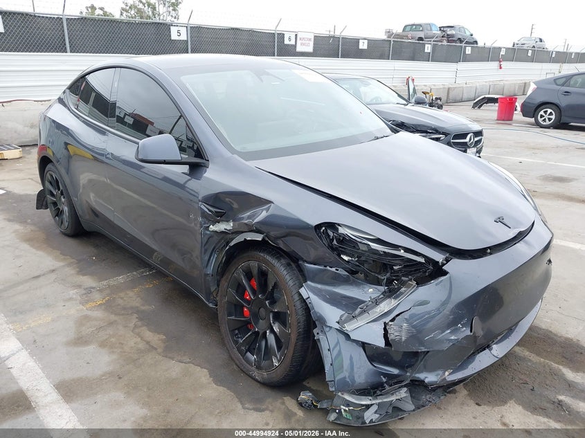 2023 Tesla Model y VIN 7SAYGDEDXPF966310 IAAI salvage auction — RIGHT FRONT, Salvage (Arizona), sold $8,700 on 2026-08-01 (photo 6)