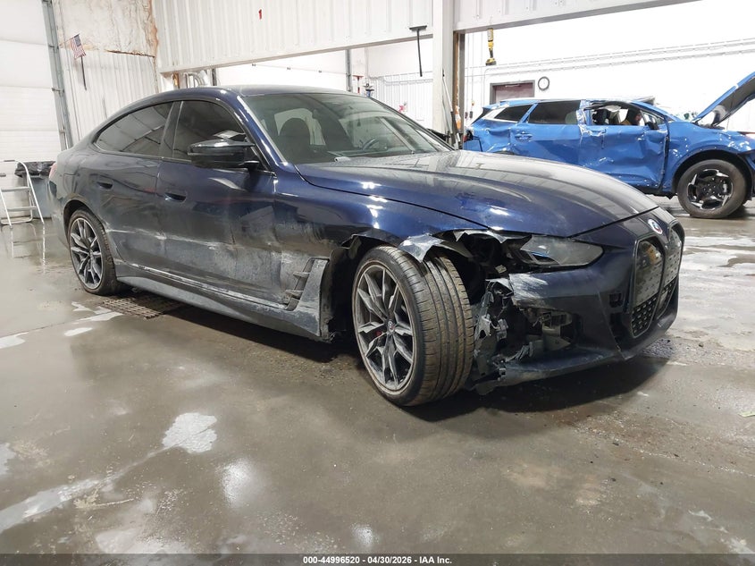 2023 BMW I4 VIN WBY33AW06PFP31605 IAAI salvage auction — SUSPENSION, Bill Of Sale (Alaska), sold $14,650 on 2026-07-09 (photo 1)