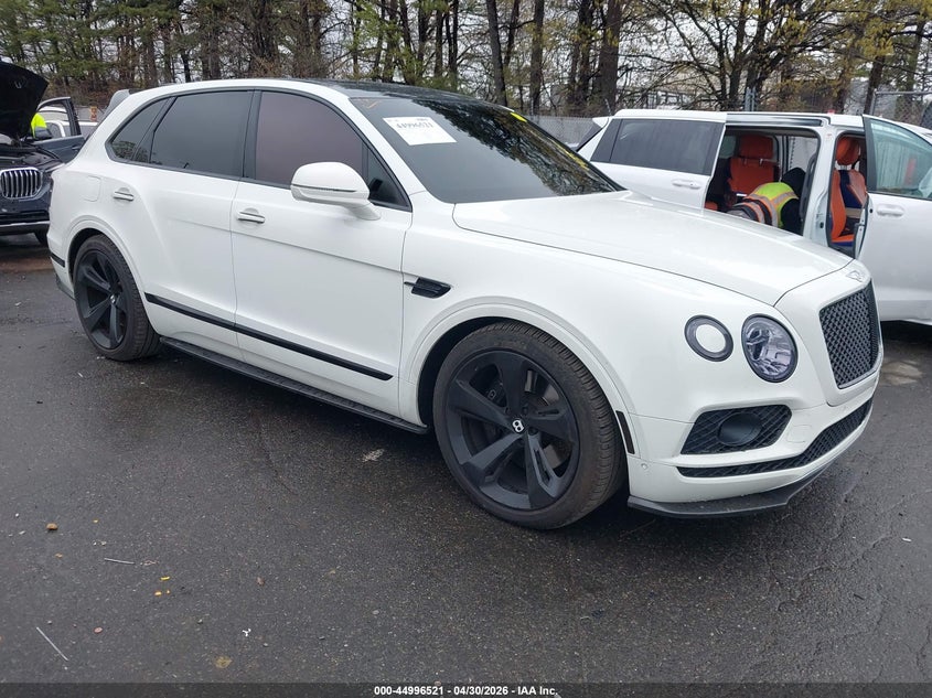 2018 Bentley Bentayga VIN SJAAC2ZV4JC020050 IAAI salvage auction — LEFT FRONT, Salvage Title, sold $36,000 on 2026-09-15 (photo 1)