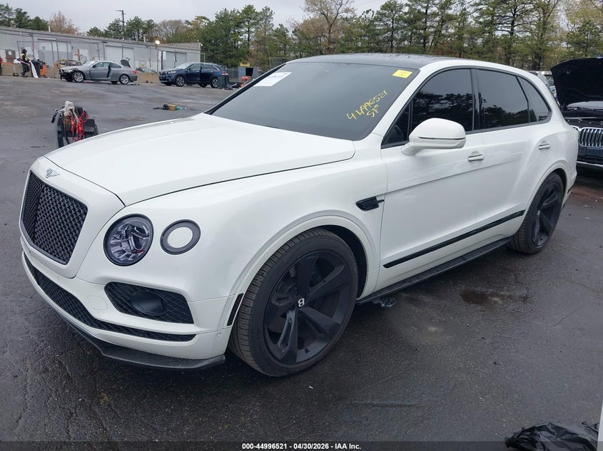 2018 Bentley Bentayga VIN SJAAC2ZV4JC020050 IAAI salvage auction — LEFT FRONT, Salvage Title, sold $36,000 on 2026-09-15 (photo 2)