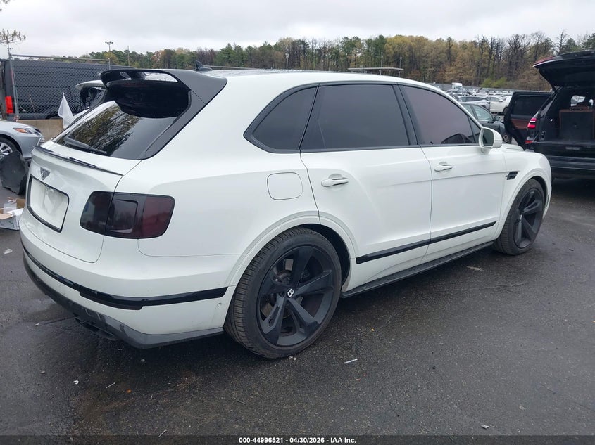 2018 Bentley Bentayga VIN SJAAC2ZV4JC020050 IAAI salvage auction — LEFT FRONT, Salvage Title, sold $36,000 on 2026-09-15 (photo 4)