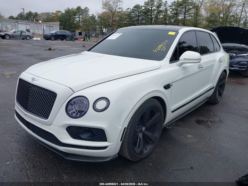 2018 Bentley Bentayga VIN SJAAC2ZV4JC020050 IAAI salvage auction — LEFT FRONT, Salvage Title, sold $36,000 on 2026-09-15 (photo 6)