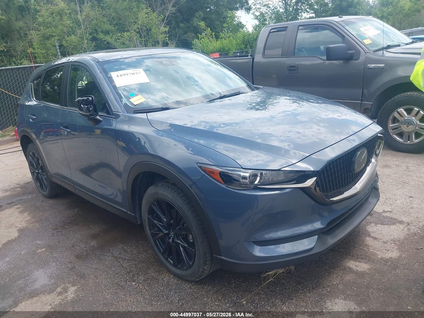 2021 Mazda Cx-5 VIN JM3KFBCM6M0401888 IAAI salvage auction — HAIL, Salvage Title, sold $8,825 on 2026-07-29 (photo 1)