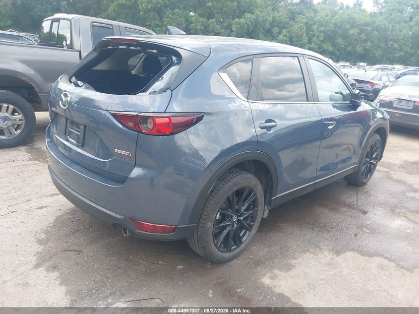 2021 Mazda Cx-5 VIN JM3KFBCM6M0401888 IAAI salvage auction — HAIL, Salvage Title, sold $8,825 on 2026-07-29 (photo 4)