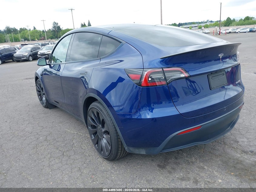 2023 Tesla Model y VIN 7SAYGDEF9PF664833 IAAI salvage auction — RIGHT SIDE, Salvage (Oregon), sold $12,900 on 2026-07-30 (photo 3)