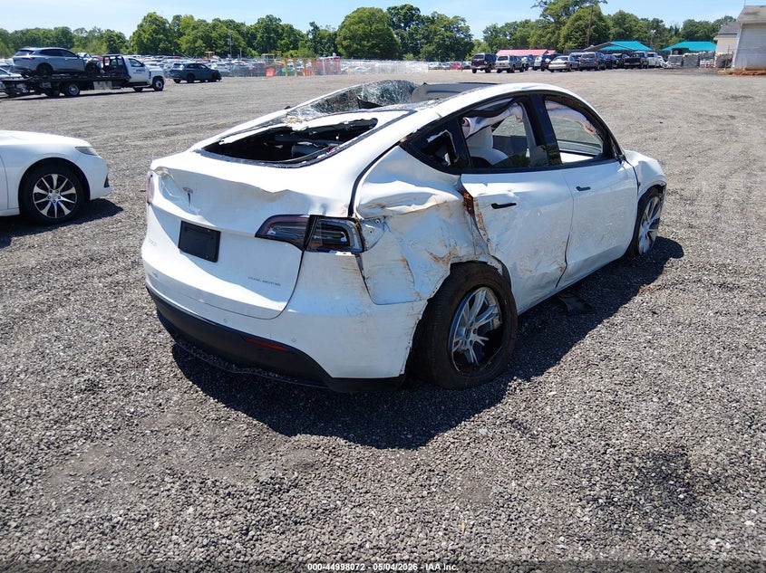 2022 Tesla Model y VIN 7SAYGDEE4NF320007 IAAI salvage auction — THEFT, Salvage (South Carolina), sold $25 on 2026-07-28 (photo 4)