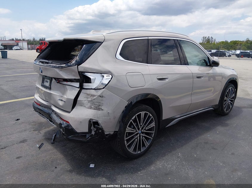 2026 BMW X1 VIN WBX73EF08T5560384 IAAI salvage auction — REAR END, Rebuildable (Florida), sold $16,450 on 2026-07-20 (photo 4)