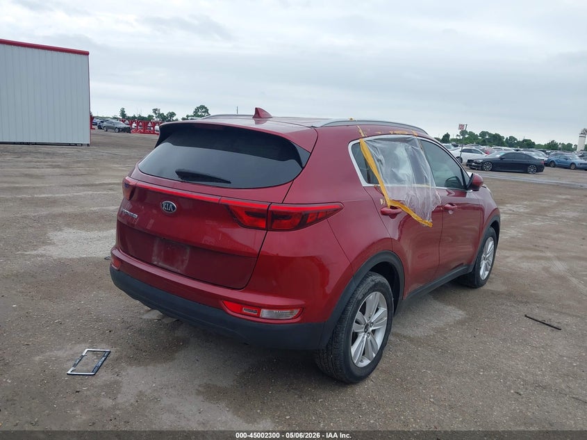 2019 Kia Sportage VIN KNDPM3ACXK7611855 IAAI salvage auction — WATER/FLOOD, Salvage (Texas), sold $2,350 on 2026-07-21 (photo 4)