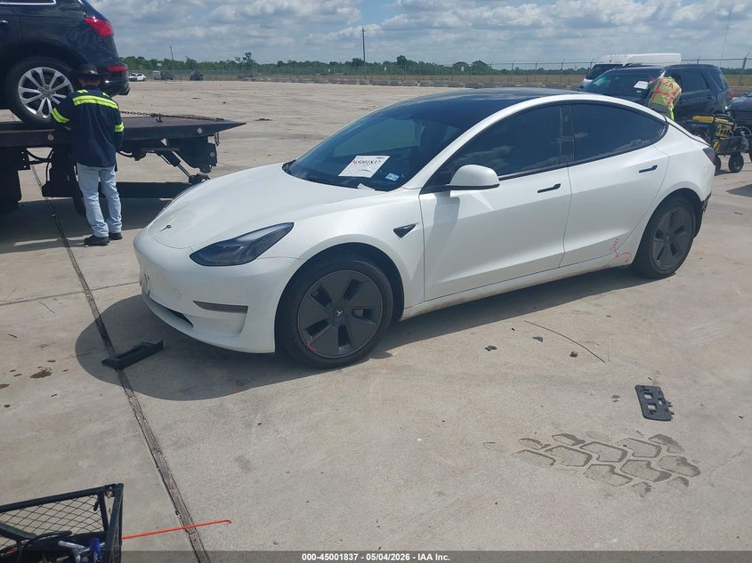 2023 Tesla Model 3 VIN 5YJ3E1EA1PF600706 IAAI salvage auction — REAR END, Original (Texas), sold $7,600 on 2026-07-23 (photo 2)