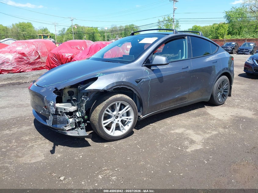 2023 Tesla Model y VIN 7SAYGAEEXPF967271 IAAI salvage auction — FRONT END, Salvage (Idaho), sold $14,300 on 2026-07-15 (photo 2)