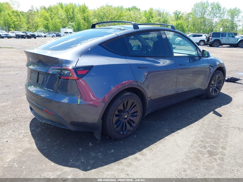 2023 Tesla Model y VIN 7SAYGAEEXPF967271 IAAI salvage auction — FRONT END, Salvage (Idaho), sold $14,300 on 2026-07-15 (photo 4)