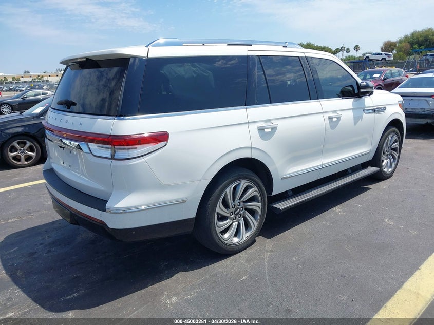 2023 Lincoln Navigator VIN 5LMJJ2KG8PEL01726 IAAI salvage auction — LEFT SIDE, Rebuildable (Florida), sold $18,800 on 2026-07-27 (photo 4)