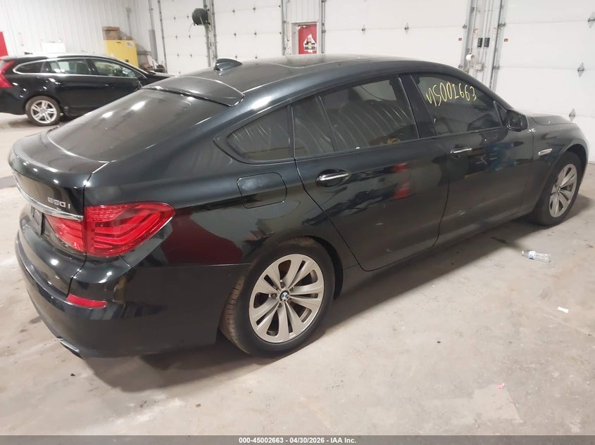 2010 BMW 5 series VIN WBASN4C54AC208324 IAAI salvage auction — LEFT SIDE, Prior Salvage (Minnesota), sold $1,400 on 2026-07-15 (photo 4)