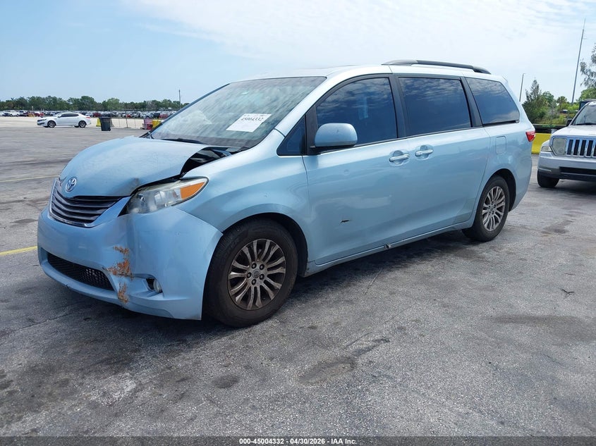 2016 Toyota Sienna VIN 5TDYK3DCXGS717905 IAAI salvage auction — LEFT SIDE, Rebuildable (Florida), sold $1,825 on 2026-07-23 (photo 2)