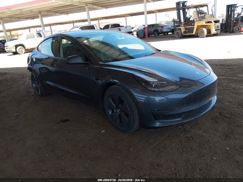 2023 Tesla Model 3 VIN 5YJ3E1EA0PF700747 — IAAI salvage auction photo