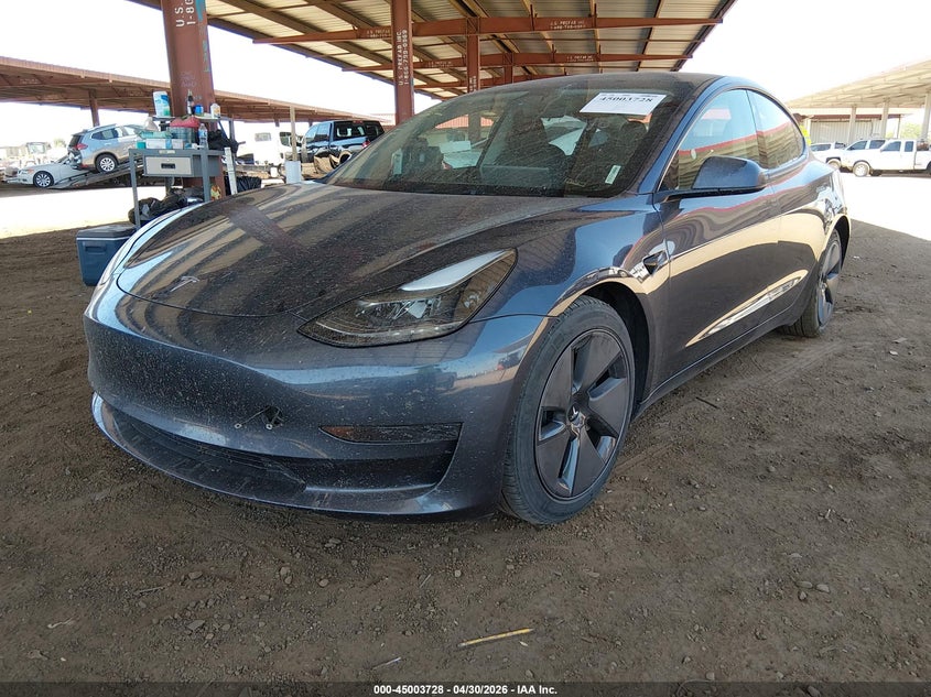 2023 Tesla Model 3 VIN 5YJ3E1EA0PF700747 IAAI salvage auction — RIGHT REAR, Salvage Title, sold $7,650 on 2026-09-10 (photo 2)