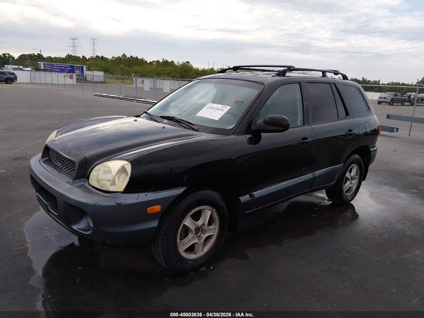 2002 Hyundai Santa fe VIN KM8SC13D12U149643 IAAI salvage auction — NORMAL WEAR, Clear (Florida), sold $300 on 2026-07-06 (photo 2)