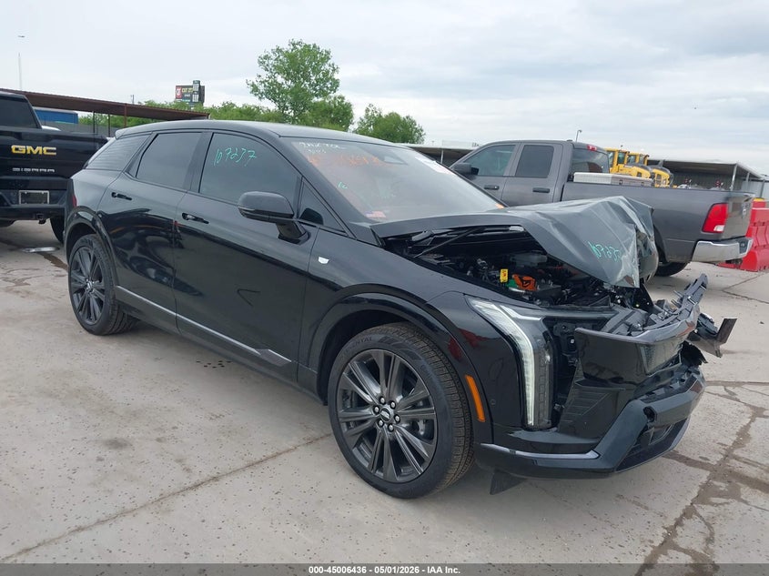 2025 Cadillac Optiq VIN 3GYK3GMR2SS146147 IAAI salvage auction — LEFT SIDE, Salvage (Texas), sold $13,600 on 2026-07-15 (photo 1)