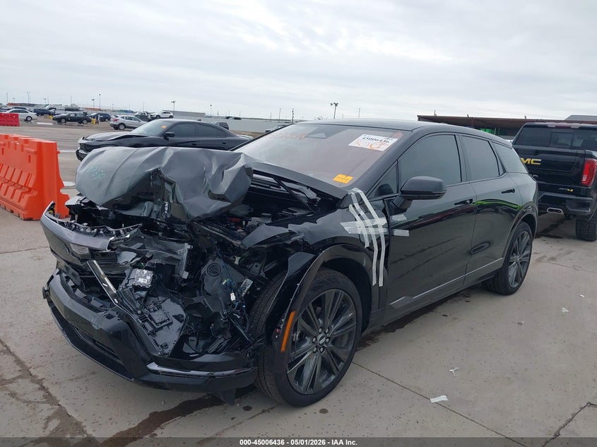 2025 Cadillac Optiq VIN 3GYK3GMR2SS146147 IAAI salvage auction — LEFT SIDE, Salvage (Texas), sold $13,600 on 2026-07-15 (photo 2)