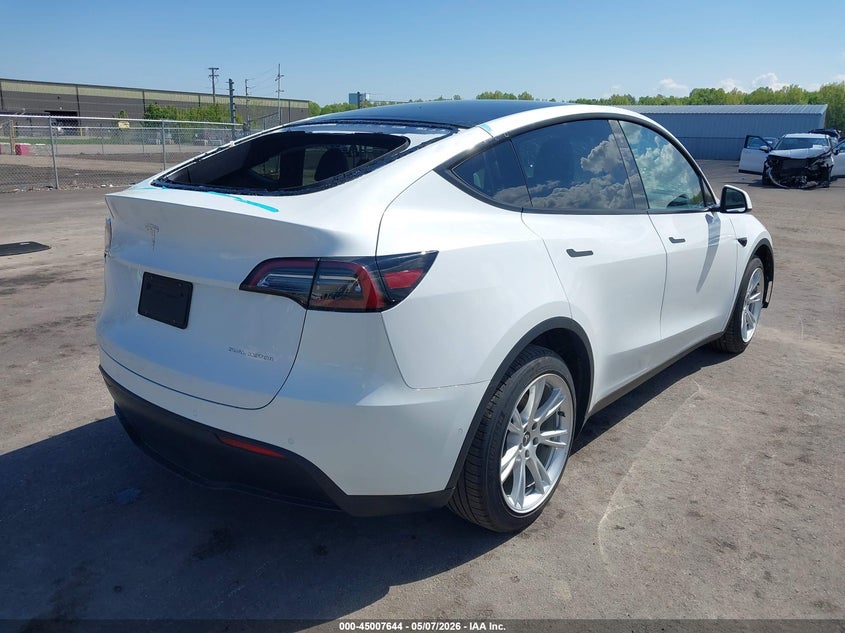 2022 Tesla Model y VIN 7SAYGDEE4NF307693 IAAI salvage auction — HAIL, Salvage (Ohio), sold $13,675 on 2026-07-28 (photo 4)