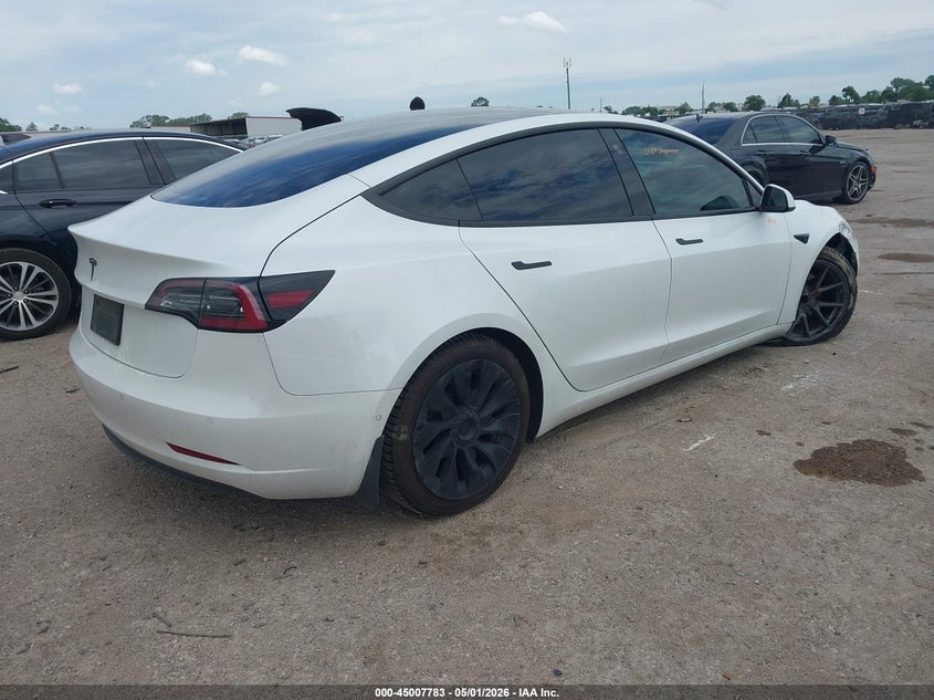 2021 Tesla Model 3 VIN 5YJ3E1EA8MF093959 IAAI salvage auction — RIGHT FRONT, Salvage (Texas), sold $4,375 on 2026-07-14 (photo 4)