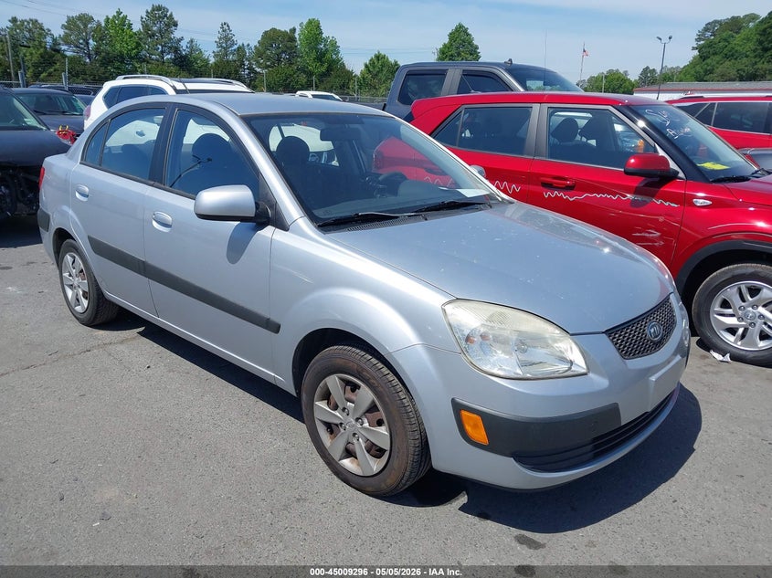 2009 Kia Rio VIN KNADE223996553372 IAAI salvage auction — NORMAL WEAR, Clear (Michigan), sold $300 on 2026-07-20 (photo 1)