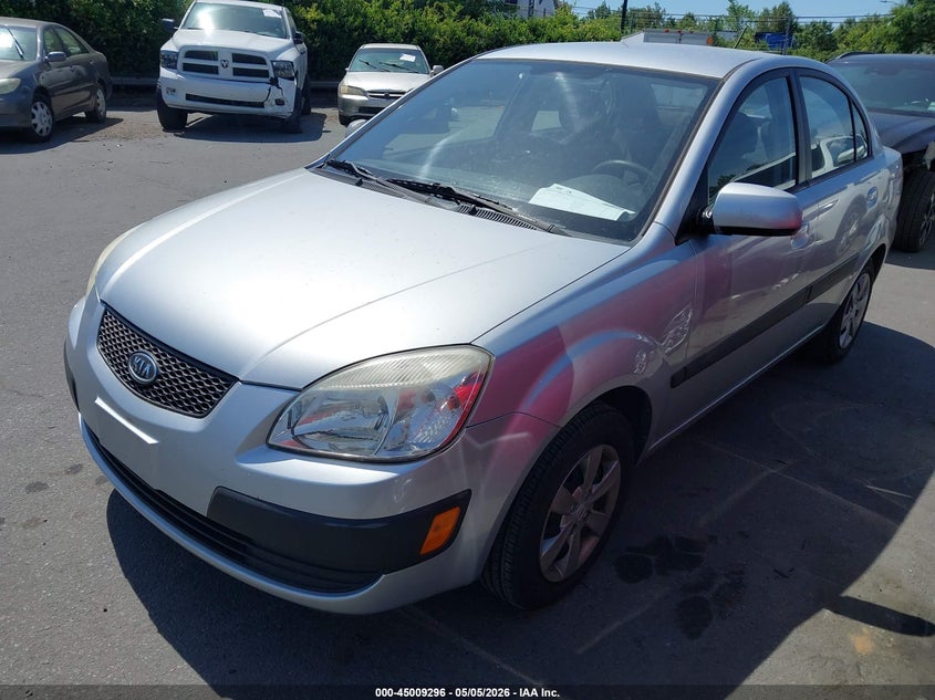 2009 Kia Rio VIN KNADE223996553372 IAAI salvage auction — NORMAL WEAR, Clear (Michigan), sold $300 on 2026-07-20 (photo 2)