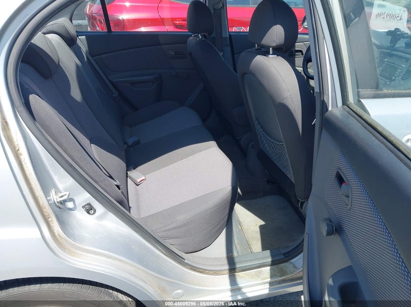 2009 Kia Rio VIN KNADE223996553372 IAAI salvage auction — NORMAL WEAR, Clear (Michigan), sold $300 on 2026-07-20 (photo 8)