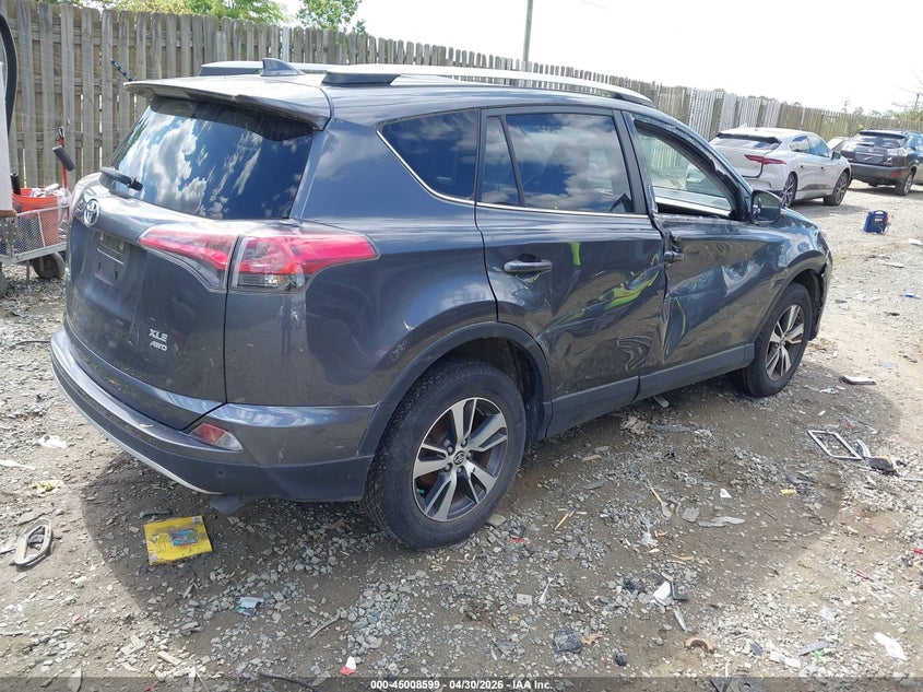 2016 Toyota Rav 4 VIN JTMRFREV5GD184188 IAAI salvage auction — NORMAL WEAR, Clear (Texas), sold $5,750 on 2026-07-13 (photo 4)