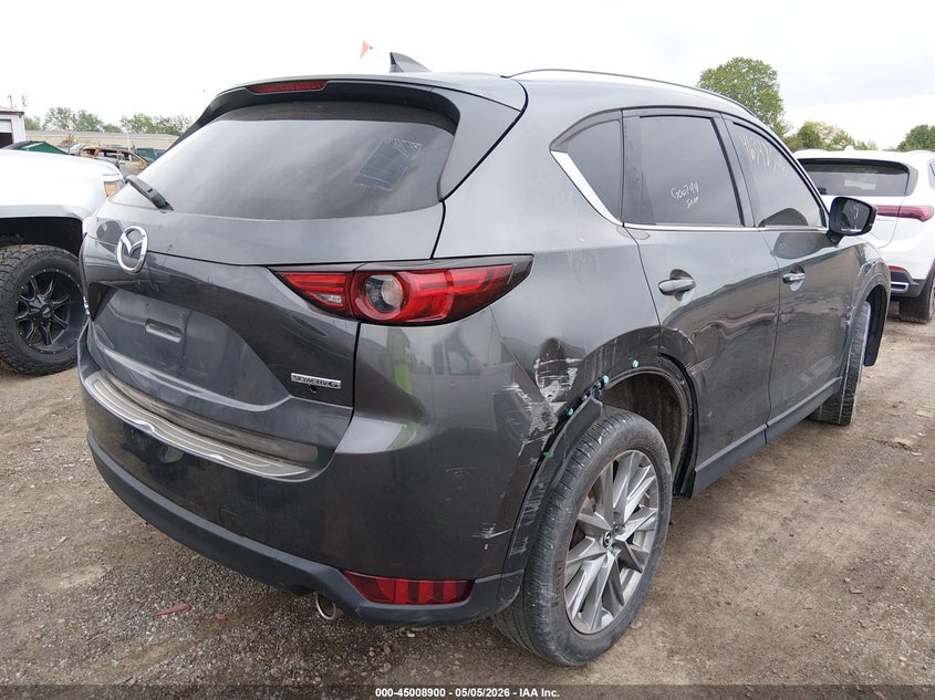 2021 Mazda Cx-5 VIN JM3KFBDMXM0412519 IAAI salvage auction — LEFT FRONT, Clear (Colorado), sold $6,025 on 2026-07-08 (photo 4)