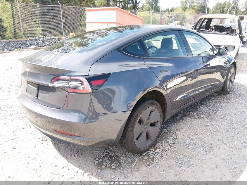 2023 Tesla Model 3 VIN 5YJ3E1EA5PF411377 IAAI salvage auction — LEFT FRONT, Bill Of Sale (Washington), sold $5,800 on 2026-07-29 (photo 4)