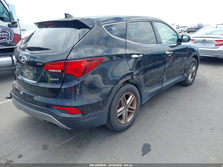 2017 Hyundai Santa fe VIN 5XYZT3LB5HG384800 IAAI salvage auction — LEFT REAR, Salvage (Idaho), sold $1,900 on 2026-07-15 (photo 4)