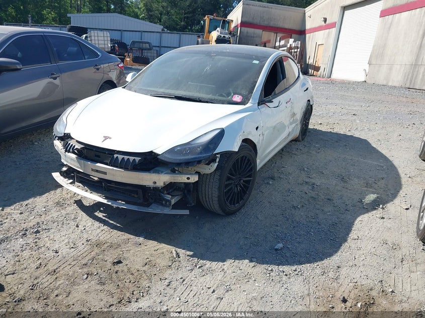 2022 Tesla Model 3 VIN 5YJ3E1EB0NF105127 IAAI salvage auction — ALL OVER, Salvage (Georgia), sold $5,600 on 2026-07-23 (photo 2)