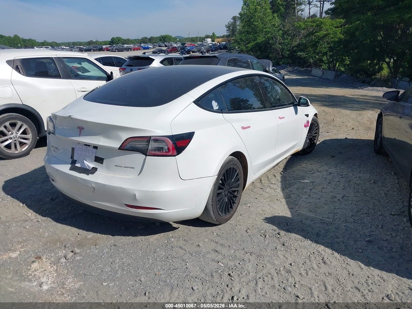 2022 Tesla Model 3 VIN 5YJ3E1EB0NF105127 IAAI salvage auction — ALL OVER, Salvage (Georgia), sold $5,600 on 2026-07-23 (photo 4)