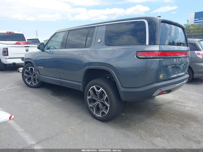 2023 Rivian R1s VIN 7PDSGABL7PN007583 IAAI salvage auction — SIDE, Salvage (California), sold $19,500 on 2026-09-22 (photo 3)
