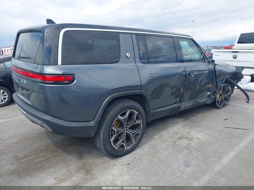2023 Rivian R1s VIN 7PDSGABL7PN007583 IAAI salvage auction — SIDE, Salvage (California), sold $19,500 on 2026-09-22 (photo 4)