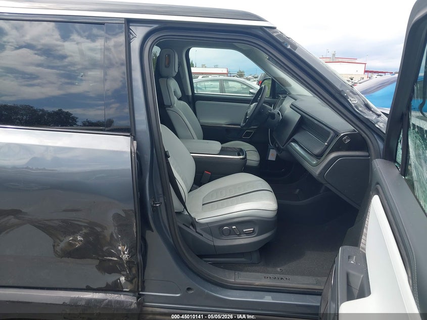 2023 Rivian R1s VIN 7PDSGABL7PN007583 IAAI salvage auction — SIDE, Salvage (California), sold $19,500 on 2026-09-22 (photo 5)