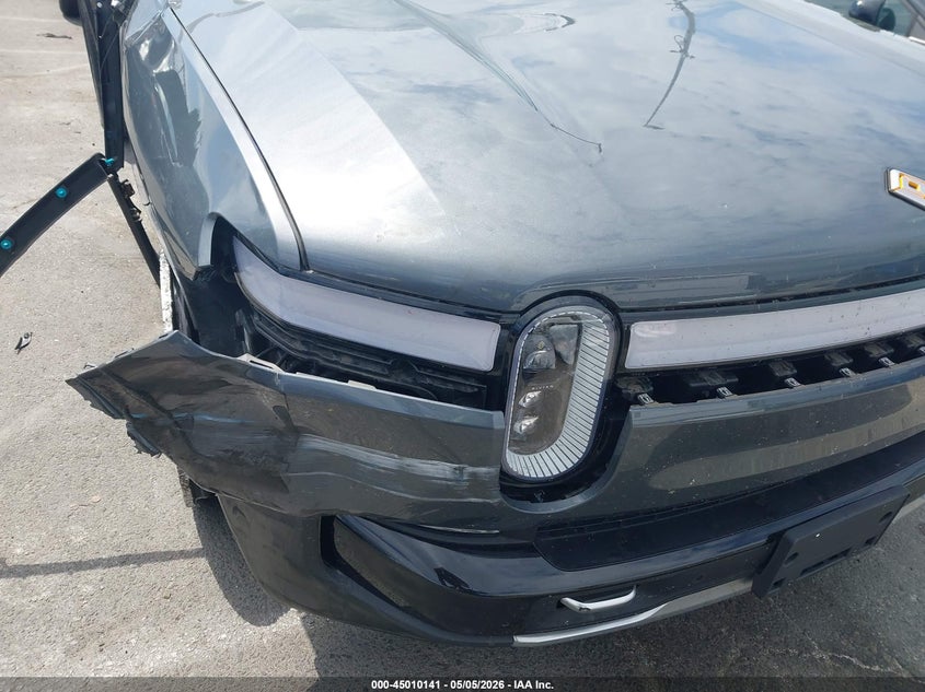 2023 Rivian R1s VIN 7PDSGABL7PN007583 IAAI salvage auction — SIDE, Salvage (California), sold $19,500 on 2026-09-22 (photo 6)