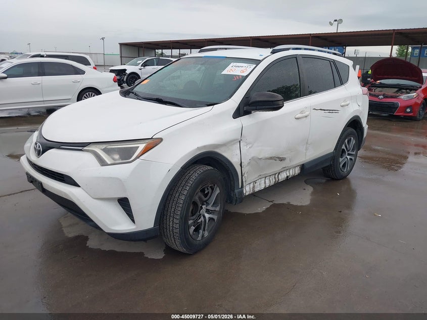 2016 Toyota Rav 4 VIN JTMZFREV4GJ093835 IAAI salvage auction — LEFT SIDE, Salvage (Texas), sold $25 on 2026-07-29 (photo 2)