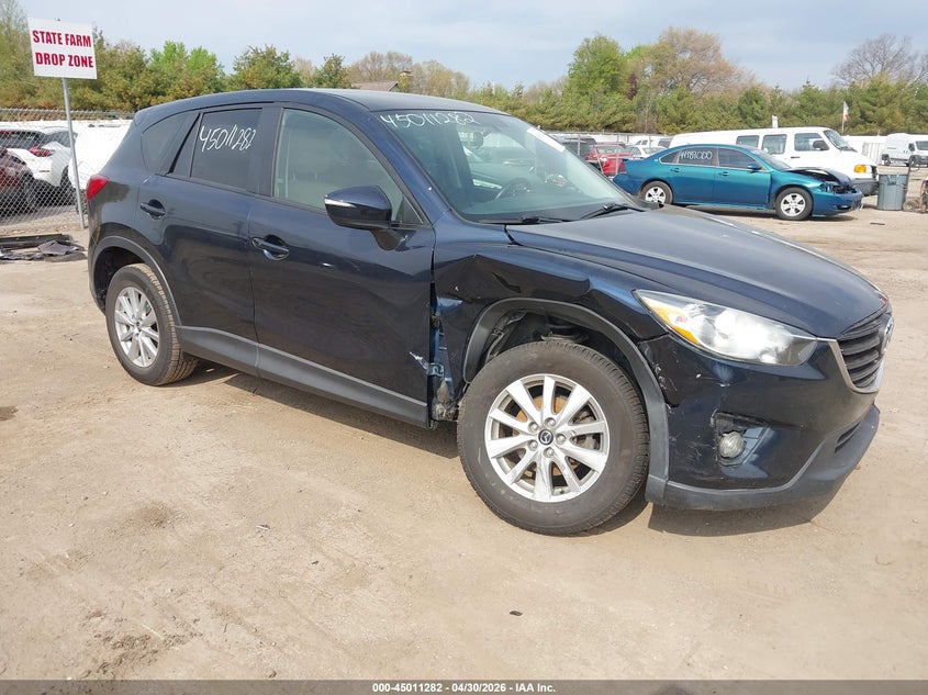 2016 Mazda Cx-5 VIN JM3KE4CY1G0628069 IAAI salvage auction — RIGHT SIDE, Salvage (Tennessee), sold $4,000 on 2026-07-14 (photo 1)